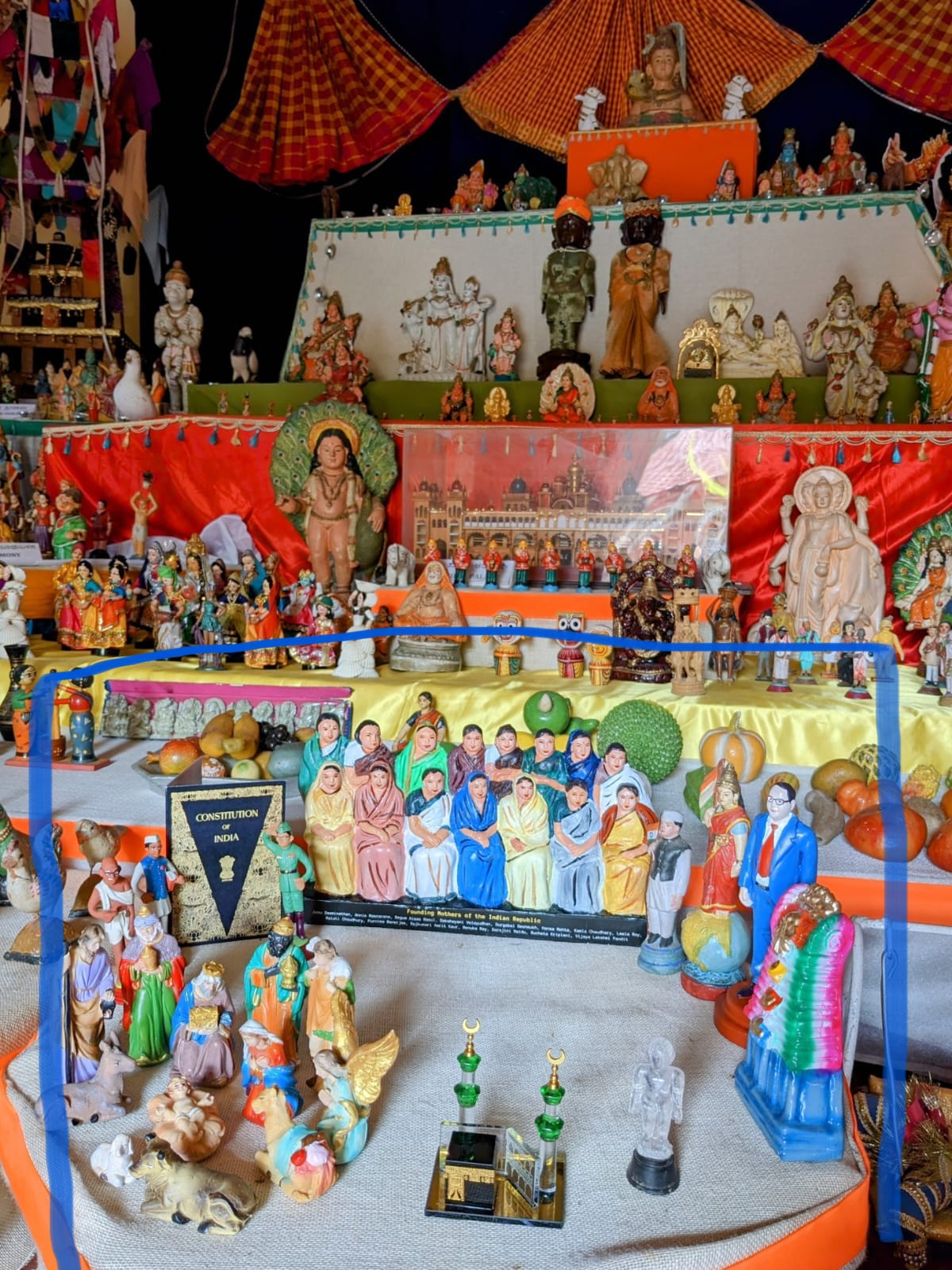 Sponsored Dasara Doll festival featuring for the first time, Mothers of Democracy; Kaaba; Infant Jesus; LGBTQ display